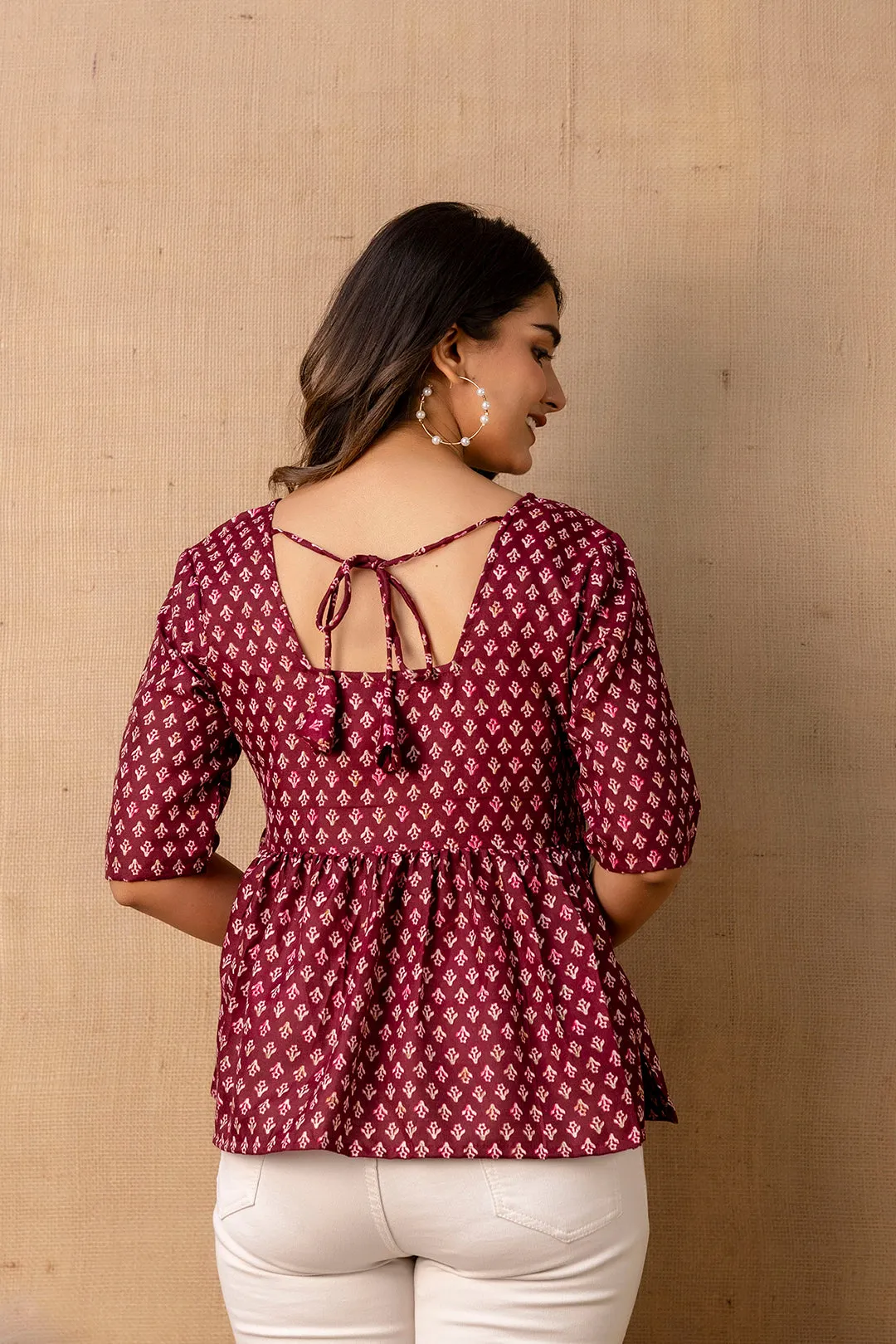 Women Burgundy Printed V-Neck Peplum Tunic